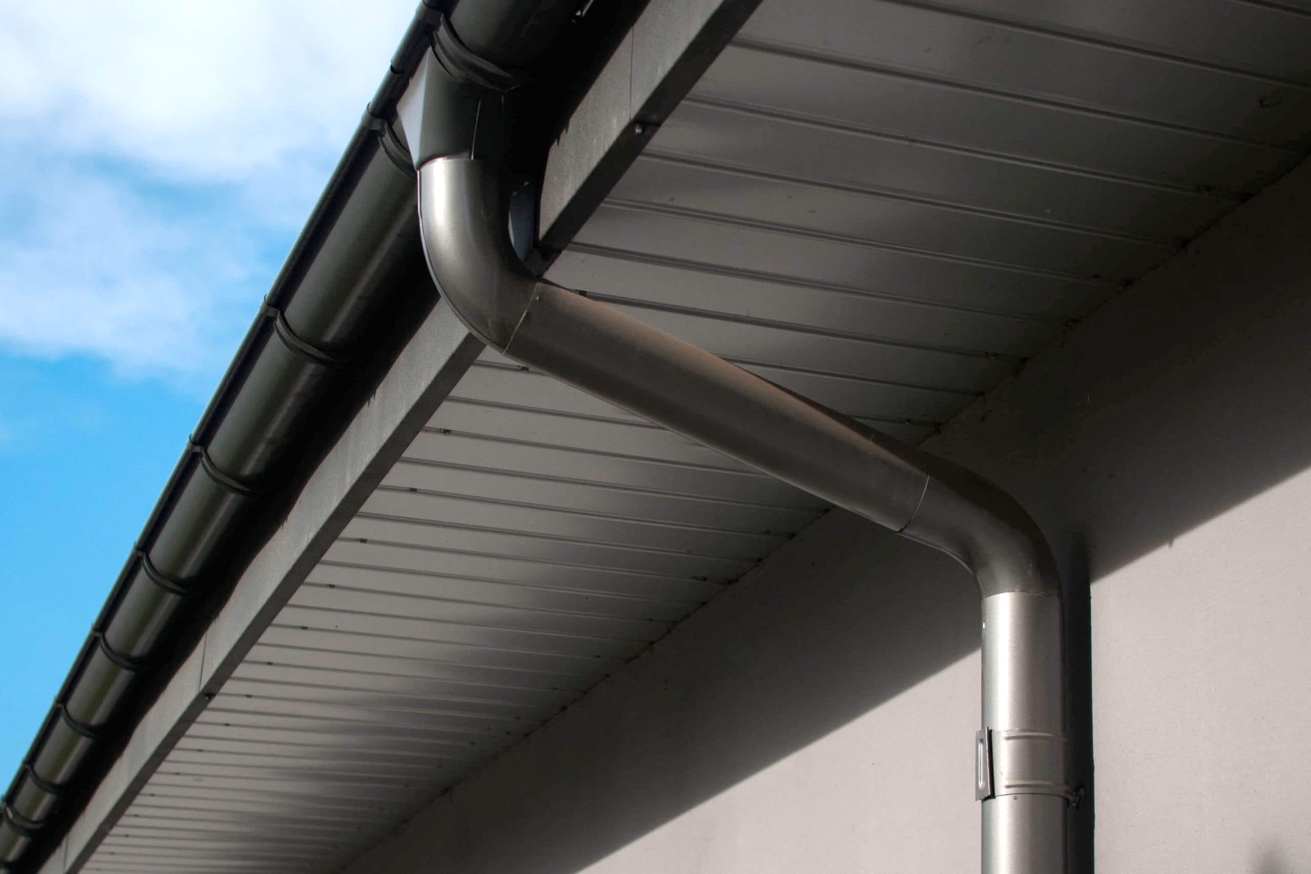 Corrosion-resistant galvanized gutters installed on a commercial building in Port Saint Lucie